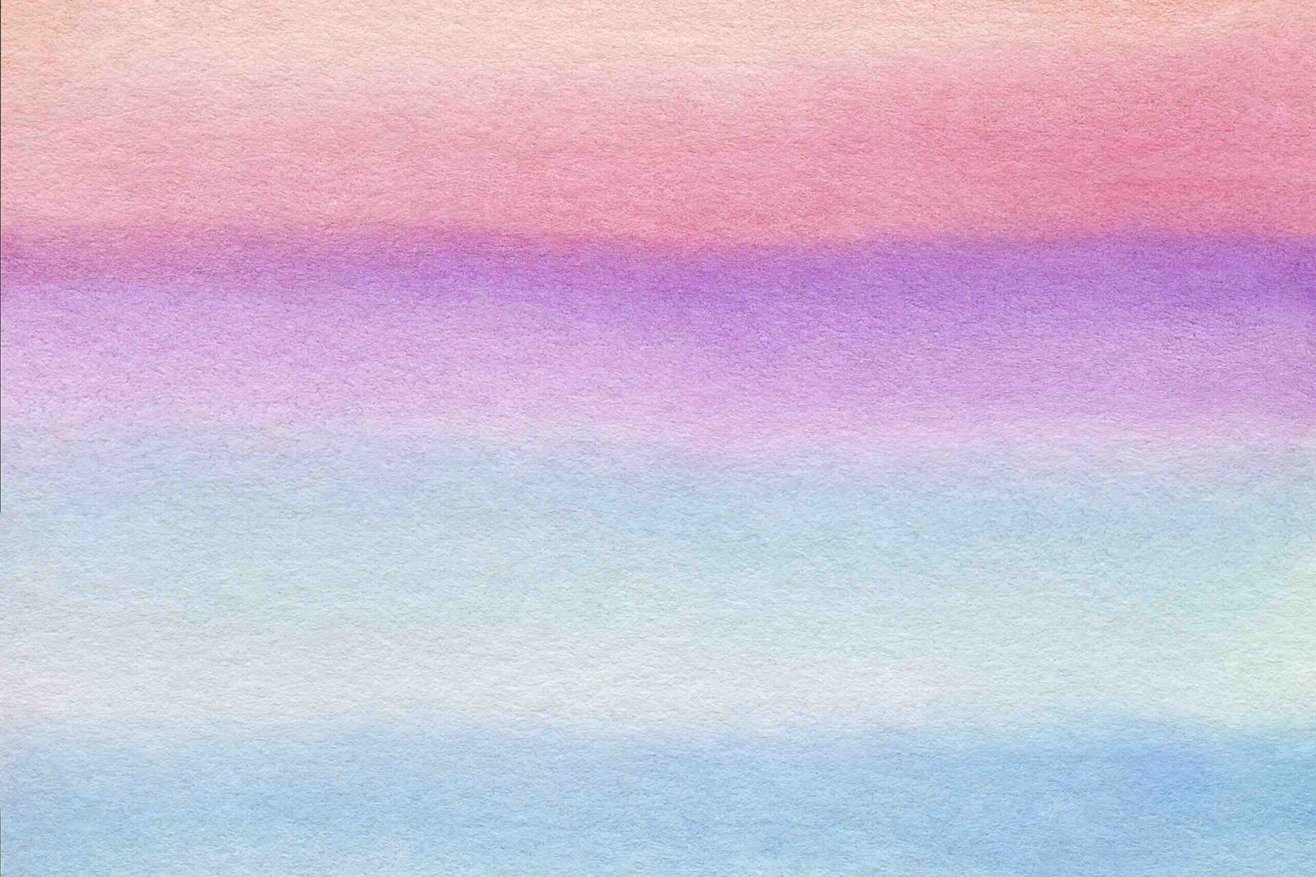 Soft pastel watercolor gradient in pink and blue
