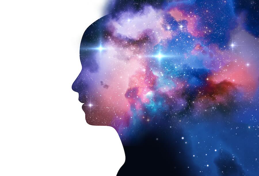 silhouette of virtual human with aura chakras on space nebula 3d illustration silhouette of virtual human with aura chakras on space nebula , represent meditation,yoga<br />
and deep sleep therapy.
